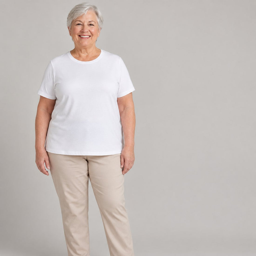 Woman about 70 wearing the white built-in bra T-shirt, front view
