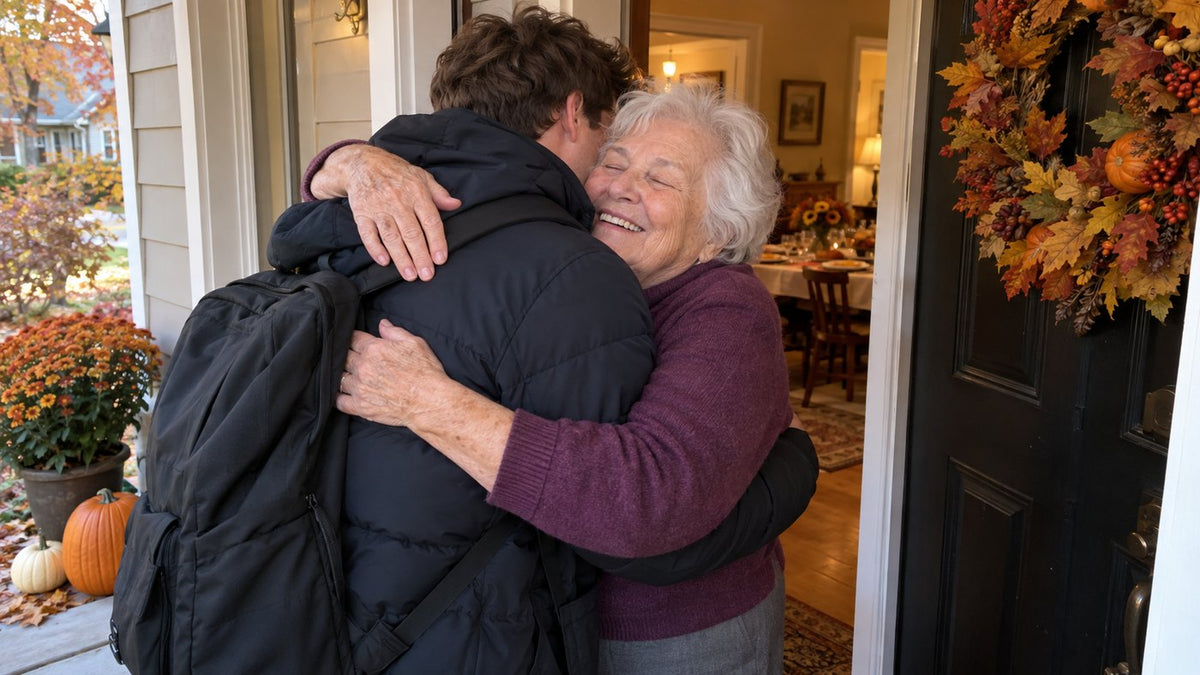 Imogene hugging her grandson with both arms at the front door
